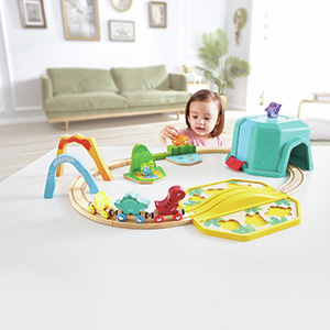 Equipo de tren de dinosaurios con cubo - Hape