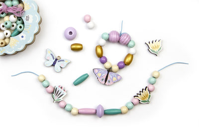 Pulseras: Cuentas de madera de mariposa - Toopiz